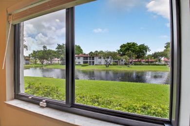 A picture says 1000 words. Elegantly renovated end unit with on Boca Lago Golf and Country Club in Florida - for sale on GolfHomes.com, golf home, golf lot