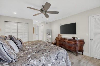 A picture says 1000 words. Elegantly renovated end unit with on Boca Lago Golf and Country Club in Florida - for sale on GolfHomes.com, golf home, golf lot