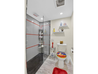 A picture says 1000 words. Elegantly renovated end unit with on Boca Lago Golf and Country Club in Florida - for sale on GolfHomes.com, golf home, golf lot