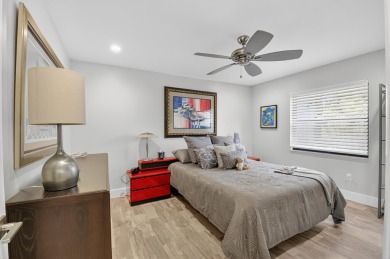 A picture says 1000 words. Elegantly renovated end unit with on Boca Lago Golf and Country Club in Florida - for sale on GolfHomes.com, golf home, golf lot