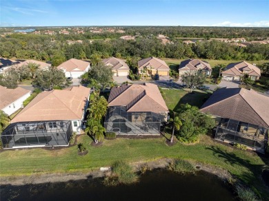 Discover Florida living in this stunning 4-bedroom, 3-bathroom on River Strand Golf and Country Club At Heritage Harbour  in Florida - for sale on GolfHomes.com, golf home, golf lot