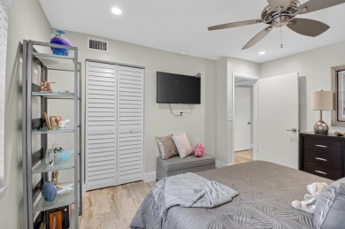 A picture says 1000 words. Elegantly renovated end unit with on Boca Lago Golf and Country Club in Florida - for sale on GolfHomes.com, golf home, golf lot