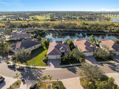 Discover Florida living in this stunning 4-bedroom, 3-bathroom on River Strand Golf and Country Club At Heritage Harbour  in Florida - for sale on GolfHomes.com, golf home, golf lot