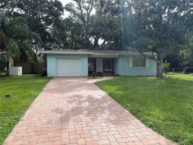 Welcome to this spacious move in ready home in one of the best on The Dunedin Country Club in Florida - for sale on GolfHomes.com, golf home, golf lot