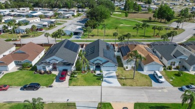 Driving up to this amazing property you will find a spacious on Polo Park East in Florida - for sale on GolfHomes.com, golf home, golf lot