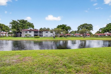 A picture says 1000 words. Elegantly renovated end unit with on Boca Lago Golf and Country Club in Florida - for sale on GolfHomes.com, golf home, golf lot