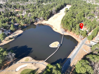 Welcome home to 253 Devonshire Avenue West in the popular Seven on Seven Lakes Country Club in North Carolina - for sale on GolfHomes.com, golf home, golf lot