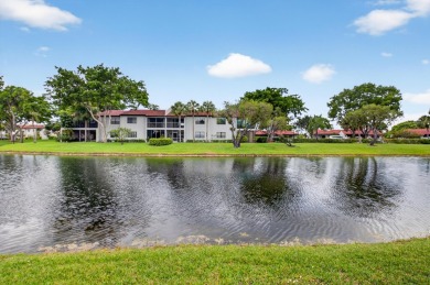 A picture says 1000 words. Elegantly renovated end unit with on Boca Lago Golf and Country Club in Florida - for sale on GolfHomes.com, golf home, golf lot