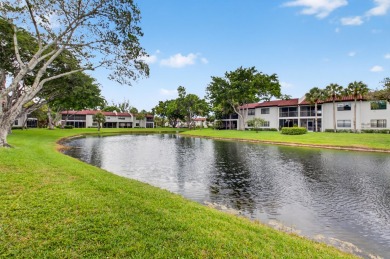 A picture says 1000 words. Elegantly renovated end unit with on Boca Lago Golf and Country Club in Florida - for sale on GolfHomes.com, golf home, golf lot