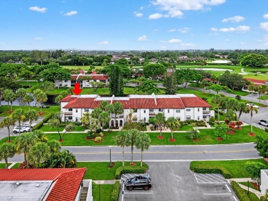 A picture says 1000 words. Elegantly renovated end unit with on Boca Lago Golf and Country Club in Florida - for sale on GolfHomes.com, golf home, golf lot