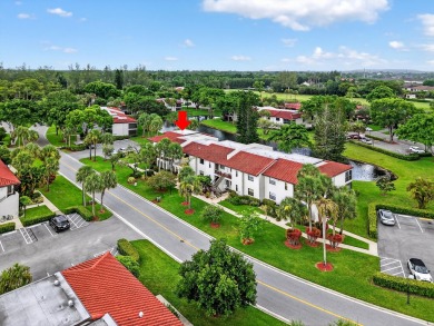 A picture says 1000 words. Elegantly renovated end unit with on Boca Lago Golf and Country Club in Florida - for sale on GolfHomes.com, golf home, golf lot