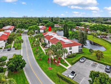 A picture says 1000 words. Elegantly renovated end unit with on Boca Lago Golf and Country Club in Florida - for sale on GolfHomes.com, golf home, golf lot