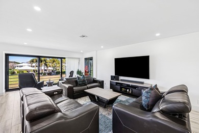 Take in stunning sunsets & serene fairway & lake views from your on Quail Ridge Golf Course and Country Club in Florida - for sale on GolfHomes.com, golf home, golf lot