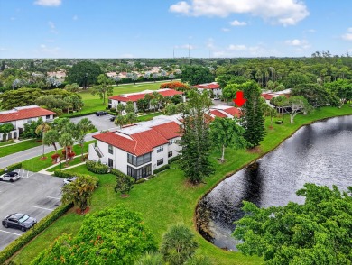 A picture says 1000 words. Elegantly renovated end unit with on Boca Lago Golf and Country Club in Florida - for sale on GolfHomes.com, golf home, golf lot