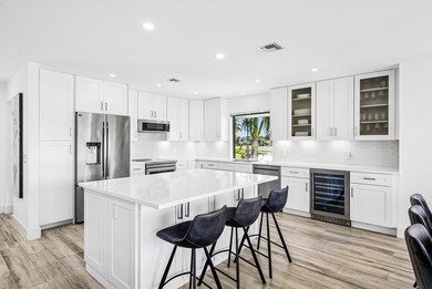 Take in stunning sunsets & serene fairway & lake views from your on Quail Ridge Golf Course and Country Club in Florida - for sale on GolfHomes.com, golf home, golf lot