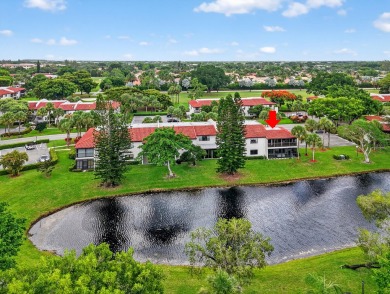 A picture says 1000 words. Elegantly renovated end unit with on Boca Lago Golf and Country Club in Florida - for sale on GolfHomes.com, golf home, golf lot