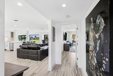 Take in stunning sunsets & serene fairway & lake views from your on Quail Ridge Golf Course and Country Club in Florida - for sale on GolfHomes.com, golf home, golf lot