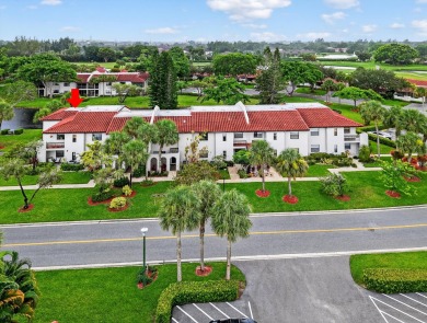 A picture says 1000 words. Elegantly renovated end unit with on Boca Lago Golf and Country Club in Florida - for sale on GolfHomes.com, golf home, golf lot
