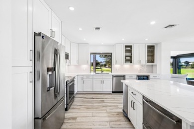 Take in stunning sunsets & serene fairway & lake views from your on Quail Ridge Golf Course and Country Club in Florida - for sale on GolfHomes.com, golf home, golf lot