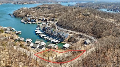 Discover this waterfront retreat with easy walkout to shoreline on Seasons Ridge At Four Seasons in Missouri - for sale on GolfHomes.com, golf home, golf lot