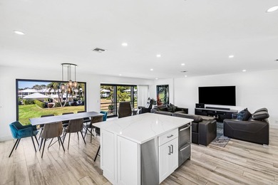 Take in stunning sunsets & serene fairway & lake views from your on Quail Ridge Golf Course and Country Club in Florida - for sale on GolfHomes.com, golf home, golf lot