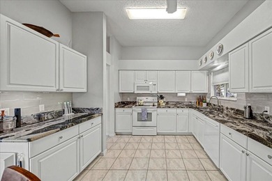 BOND PAID!!!  POOL HOME!!! A true tropical oasis awaits in this on Hacienda Hills Golf and Country Club in Florida - for sale on GolfHomes.com, golf home, golf lot