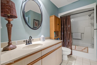 Discover easy coastal living in this desirable 2-bedroom, 2-bath on Oyster Bay Golf Links in North Carolina - for sale on GolfHomes.com, golf home, golf lot