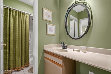 Discover easy coastal living in this desirable 2-bedroom, 2-bath on Oyster Bay Golf Links in North Carolina - for sale on GolfHomes.com, golf home, golf lot