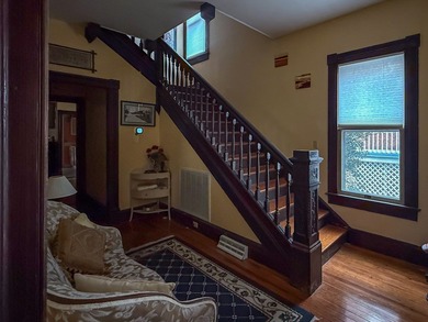 Charming Victorian Cottage w/wrap around porch on tree lined on Bay Creek Golf Club in Virginia - for sale on GolfHomes.com, golf home, golf lot