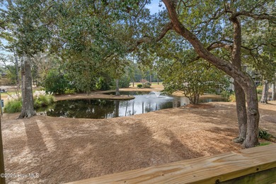 Discover easy coastal living in this desirable 2-bedroom, 2-bath on Oyster Bay Golf Links in North Carolina - for sale on GolfHomes.com, golf home, golf lot