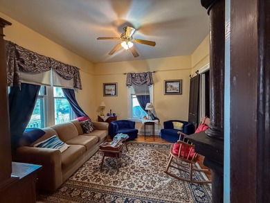 Charming Victorian Cottage w/wrap around porch on tree lined on Bay Creek Golf Club in Virginia - for sale on GolfHomes.com, golf home, golf lot