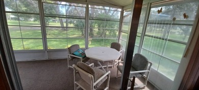 Come settle down and relax in a beautiful, manufactured home on Fairways Country Club in Florida - for sale on GolfHomes.com, golf home, golf lot