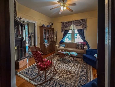 Charming Victorian Cottage w/wrap around porch on tree lined on Bay Creek Golf Club in Virginia - for sale on GolfHomes.com, golf home, golf lot