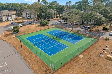 Discover easy coastal living in this desirable 2-bedroom, 2-bath on Oyster Bay Golf Links in North Carolina - for sale on GolfHomes.com, golf home, golf lot