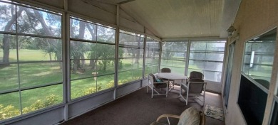 Come settle down and relax in a beautiful, manufactured home on Fairways Country Club in Florida - for sale on GolfHomes.com, golf home, golf lot