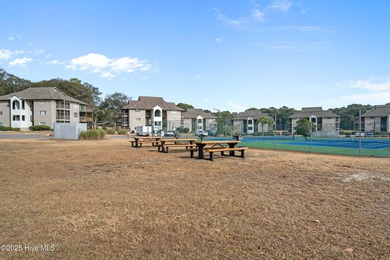 Discover easy coastal living in this desirable 2-bedroom, 2-bath on Oyster Bay Golf Links in North Carolina - for sale on GolfHomes.com, golf home, golf lot