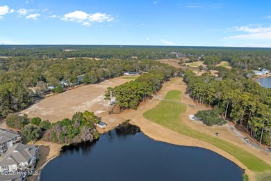 Discover easy coastal living in this desirable 2-bedroom, 2-bath on Oyster Bay Golf Links in North Carolina - for sale on GolfHomes.com, golf home, golf lot