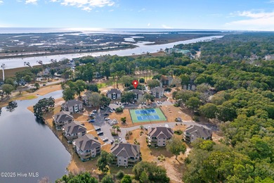 Discover easy coastal living in this desirable 2-bedroom, 2-bath on Oyster Bay Golf Links in North Carolina - for sale on GolfHomes.com, golf home, golf lot