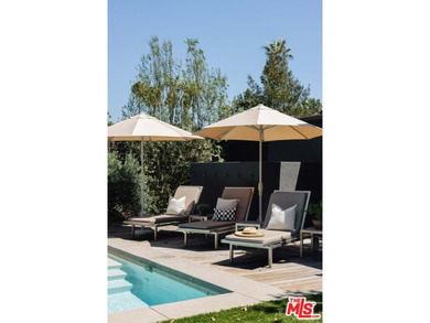 Renovated by renowned architecture firm Rios Clementi Hale, this on Wilshire Country Club in California - for sale on GolfHomes.com, golf home, golf lot