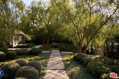 Renovated by renowned architecture firm Rios Clementi Hale, this on Wilshire Country Club in California - for sale on GolfHomes.com, golf home, golf lot