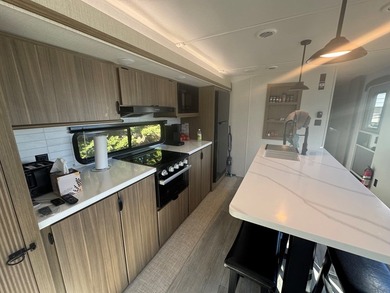 This is a rare treat.  Brand New 2025 Wildwood camper.  Just on Captains Cove Golf and Yacht Club in Virginia - for sale on GolfHomes.com, golf home, golf lot