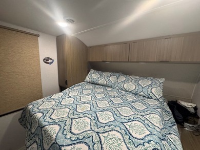 This is a rare treat.  Brand New 2025 Wildwood camper.  Just on Captains Cove Golf and Yacht Club in Virginia - for sale on GolfHomes.com, golf home, golf lot
