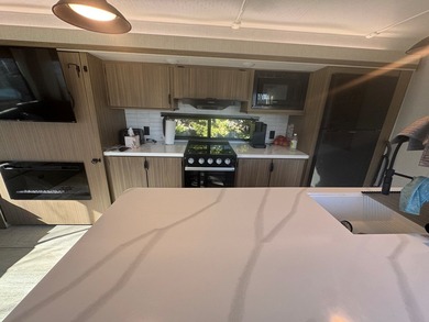 This is a rare treat.  Brand New 2025 Wildwood camper.  Just on Captains Cove Golf and Yacht Club in Virginia - for sale on GolfHomes.com, golf home, golf lot