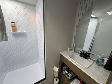 This is a rare treat.  Brand New 2025 Wildwood camper.  Just on Captains Cove Golf and Yacht Club in Virginia - for sale on GolfHomes.com, golf home, golf lot