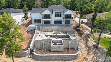 Welcome to this new construction home in Porto Cima @ Lake of on The Club At Porto Cima in Missouri - for sale on GolfHomes.com, golf home, golf lot