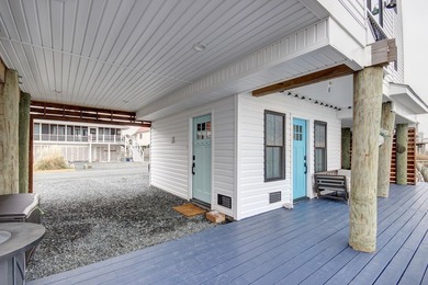 Tucked along the peaceful waters of Chincoteague Bay, this on Captains Cove Golf and Yacht Club in Virginia - for sale on GolfHomes.com, golf home, golf lot