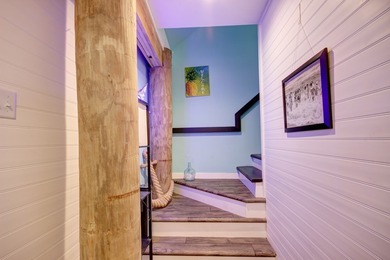 Tucked along the peaceful waters of Chincoteague Bay, this on Captains Cove Golf and Yacht Club in Virginia - for sale on GolfHomes.com, golf home, golf lot