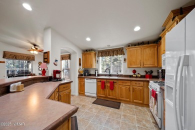 Don't miss this opportunity to own a meticulously maintained and on Pinetop Lakes Golf and Country Club in Arizona - for sale on GolfHomes.com, golf home, golf lot