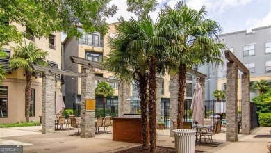 Ground floor with private patio and open view, Welcome to your on Art Foundry in Atlantic Station Golf Course in Georgia - for sale on GolfHomes.com, golf home, golf lot
