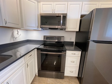 55 OR OLDER ONLYpletely renovated 1ST FLOOR UNIT. GOLF COURSE on Pine Lakes Golf Club in Florida - for sale on GolfHomes.com, golf home, golf lot